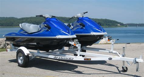 Discover the convenience of a double trailer for your water trips.